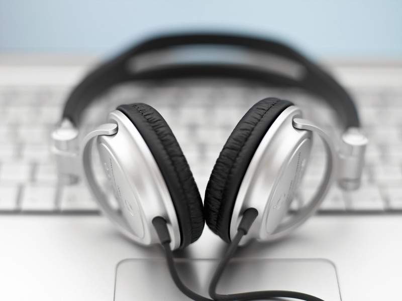 Headphones on a computer keyboard