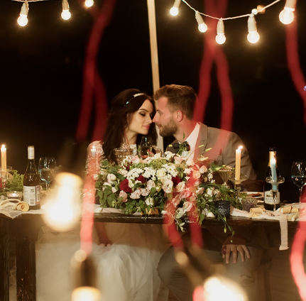 Services - A couple seated at the wedding table